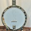 Gold Tone Mastertone OB-2 banjo front view on stand, showing chrome hardware and blue head