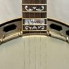 Exceptional Warren Yates "Little Banger" - an exact replica of JD Crowe's legendary 1933 Gibson RB-3 from "Old Home Place." Features sinker mahogany construction, thermal-aged rim, and Yates prewar no-hole tone ring for authentic vintage punch and clarity. Professionally repaired heel crack by Steve Huber's shop. Includes hard case.