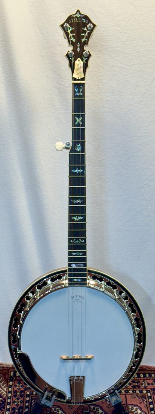Full view of 2020 Stelling Staghorn banjo serial #7339 showing claro walnut resonator with abalone staghorn inlay and ebony fingerboard