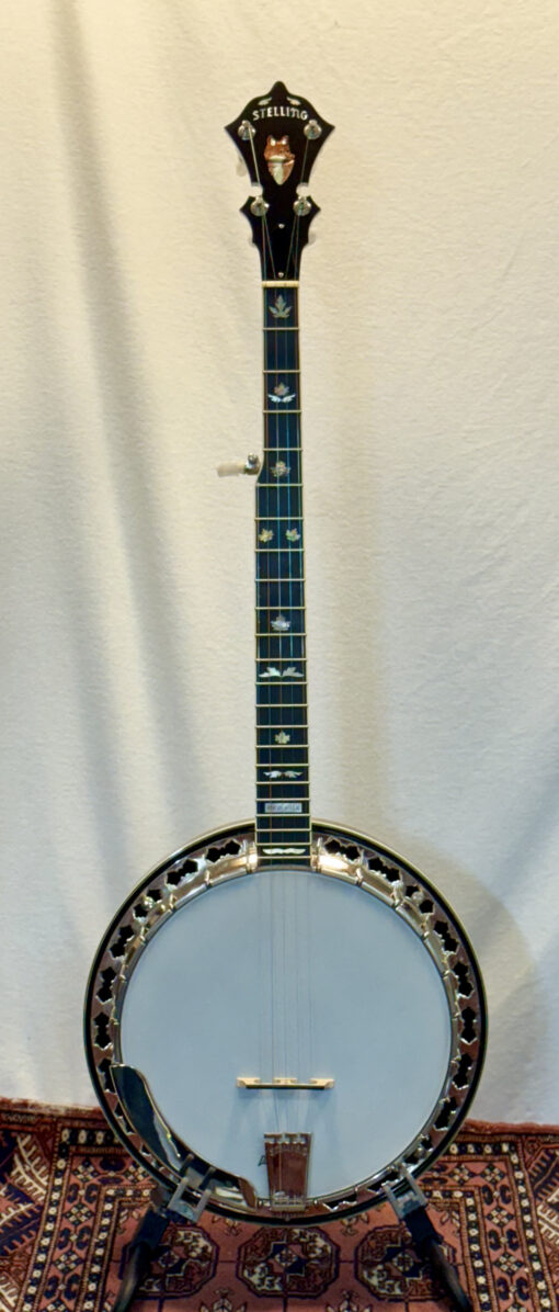 Full front view of 2003 Stelling Red Fox banjo with flame maple resonator and neck