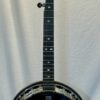1998 Deering Black Diamond banjo in pristine condition showing full front view with distinctive black mylar head and mahogany resonator