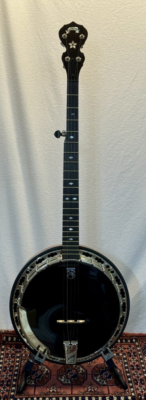 1998 Deering Black Diamond banjo in pristine condition showing full front view with distinctive black mylar head and mahogany resonator
