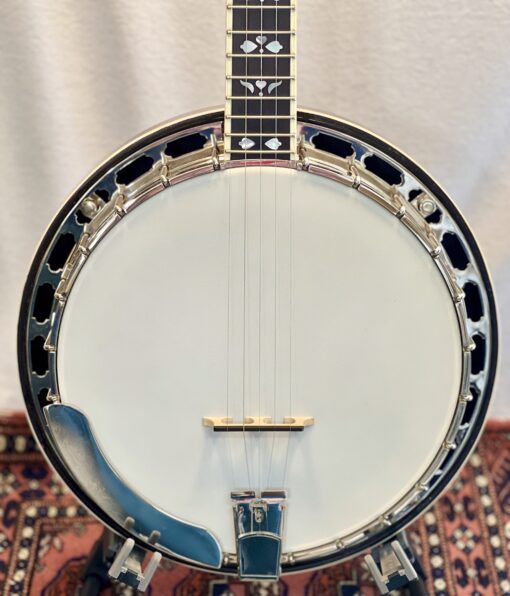 Close-up of Recording King RKR-80 banjo head and tone ring showing Remo frosted head and Mastertone-style hardware