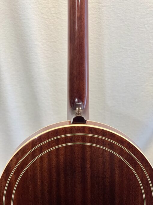Recording King RKR-80 neck heel connection showing mahogany neck joint to rim attachment point