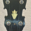 Gibson RB-250 banjo headstock showing gold Gibson logo and chrome Kluson tuners