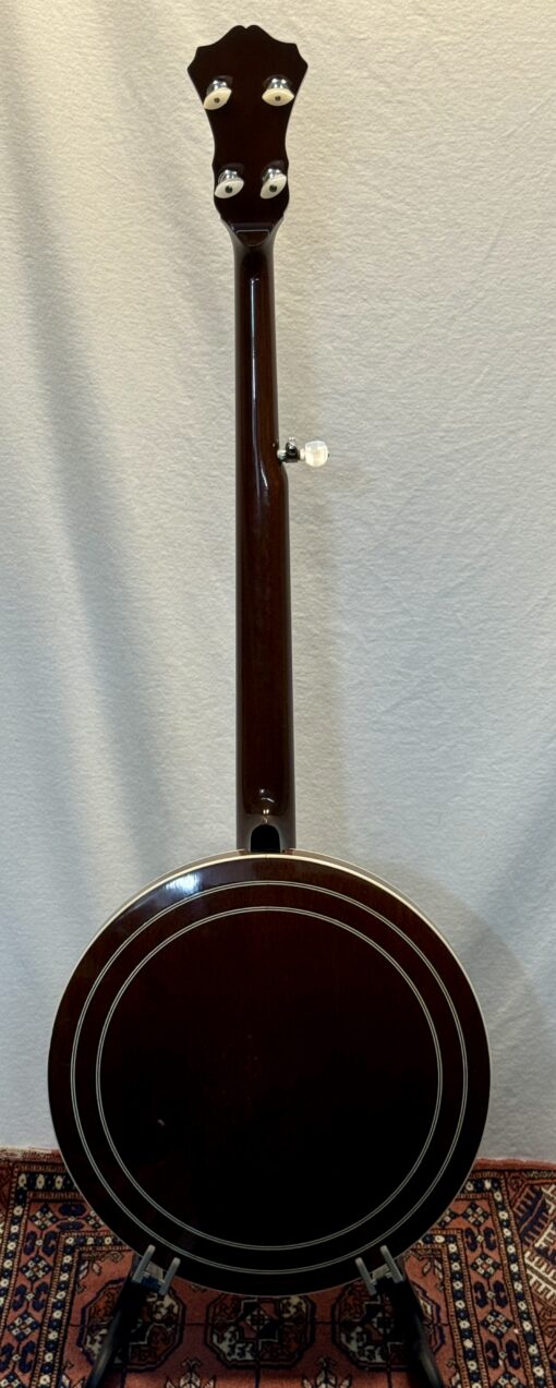 Rich & Taylor banjo resonator back detail showing rich mahogany finish and wood grain patterns