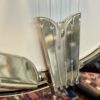 Rich & Taylor banjo tailpiece and string hardware detail showing professional grade components.