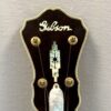 Peghead of 2005 Gibson RB-18 Top Tension showing pearl script Gibson logo and Art Deco torch inlay with gold tuners
