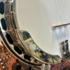 Closeup of nickel-plated armrest and one-piece flange on Shelby Blackhawk banjo