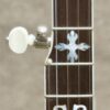 Upper frets of Gibson TB-4 fingerboard showing flying eagle mother-of-pearl inlays and 5th string tuning peg.