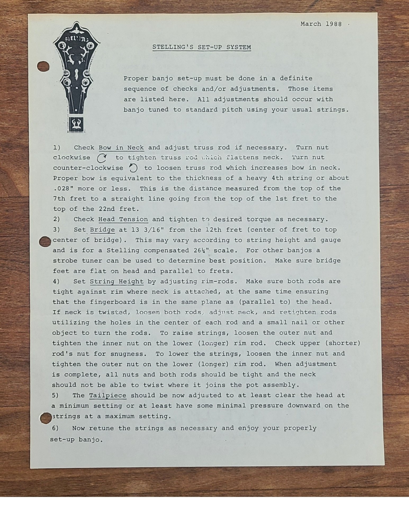 Page 1 of March 1988 Stelling Set-Up System guide featuring Stelling peghead logo and 6-step banjo setup procedure covering neck bow and truss rod adjustment, head tension, bridge position, string height, tailpiece adjustment, and tuning.