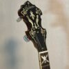 1932 Gibson TB-3 Mastertone banjo - peghead front showing Gibson script logo and flying eagle mother of pearl inlays