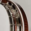 Deering Golden Era banjo traditional zinc flange with round J-hooks and notched brass tension hoop closeup