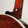 Deering Golden Era banjo neck heel and resonator joint showing figured curly maple with tapered sidewall