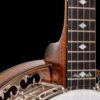 OME Ikon resonator banjo neck heel showing curly maple with deco style mother of pearl and abalone inlays on ebony fingerboard