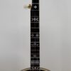 Full-length front view of the 1987 Stelling One-Bird Virginian, serial 3149, from headstock to tailpiece. Visible from top to bottom: the Stelling headstock with the mother-of-pearl Cardinal inlay that defines the One-Bird era, the walnut neck with mother-of-pearl Dogwood fingerboard inlays, the VIRGINIAN model inlay above the body, the proprietary Stelling tone ring, the gold-plated flange with hand-engraved Dogwood cutouts, and the engraved Stelling tailpiece.