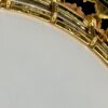 Close-up of the engraved gold-plated tension hoop and flange on the 1987 Stelling One-Bird Virginian, showing the Dogwood-shaped flange cutouts and engraved decoration on the tension hoop.