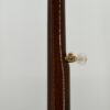 Side profile of the walnut neck on the 1987 Stelling One-Bird Virginian, showing the original gold-plated Stelling 5th-string tuner mounted on the side of the neck with a mother-of-pearl tuner button.