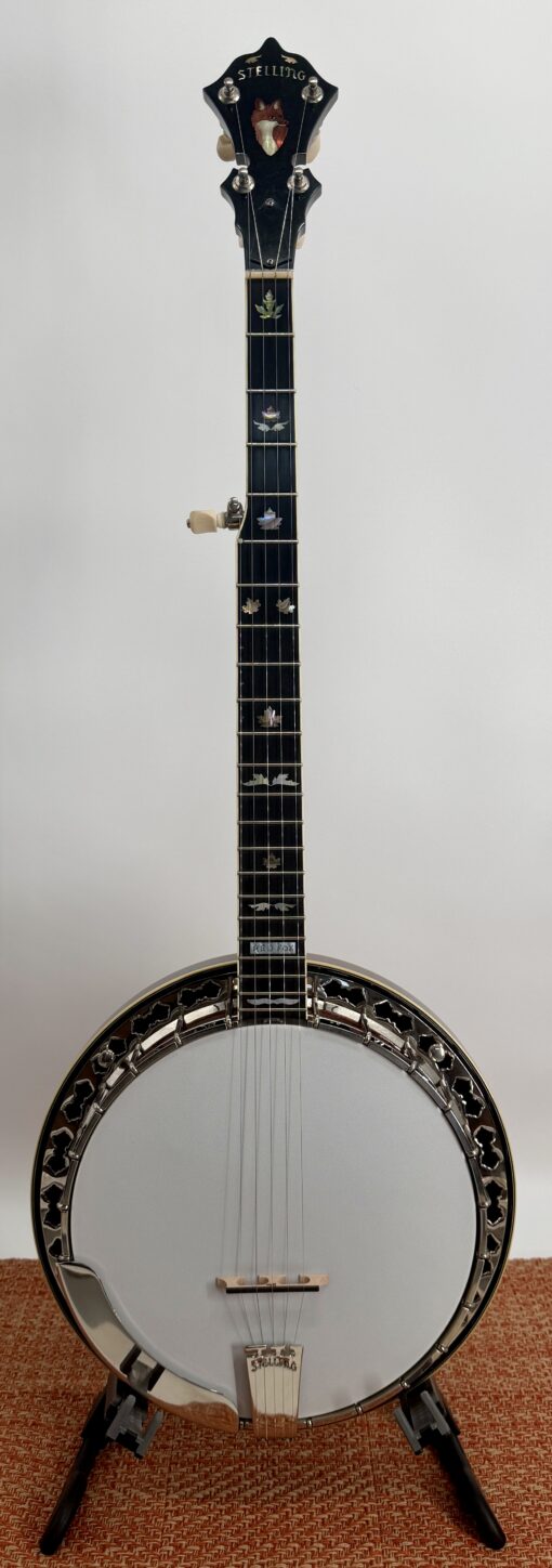 2006 Stelling Red Fox 5-string bluegrass banjo full front view showing red curly maple resonator, hand-painted fox peghead inlay, abalone maple leaf fingerboard inlays, and chrome holly leaf armrest cutouts at Banjo Warehouse