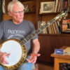 Geoff Hohwald, owner of Banjo Warehouse in Yellow Springs, Ohio, demonstrates this gold-plated, hand-engraved 1987 Stelling One-Bird Virginian from the original Philadelphia owner.