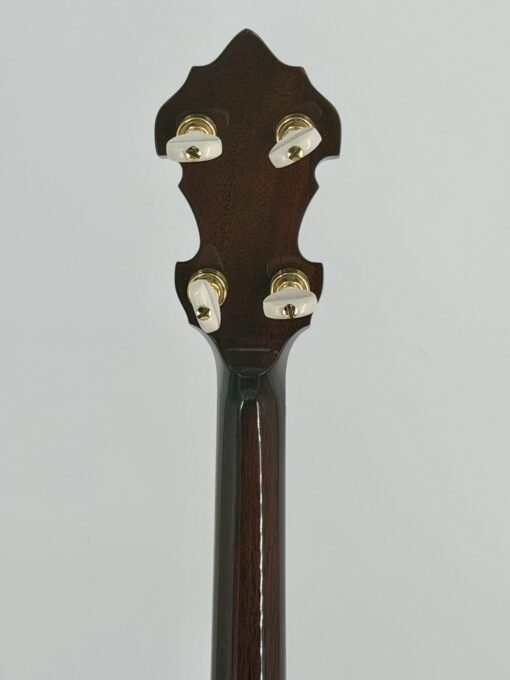 Detail of the Huber Truetone Custom 625-13 curly maple Granada resonator back with figured grain and double marquetry purfling rings Detail of the figured curly maple Granada resonator back and marquetry rings on the Huber Truetone Custom 625-13.