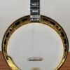 Huber Truetone Custom 625-13 banjo pot showing engraved gold Style 6 one-piece flange, Truetone neck heel, and white Renaissance-style head Close view of the Huber Truetone Custom 625-13 pot with the engraved gold Style 6 flange and Truetone heel.