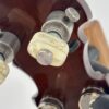 Gibson Keith tuners on the 1988 Earl Scruggs Standard, with Gibson engraved on the buttons