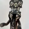 Fiddle-shaped peghead with GTR script inlay and Custom Made truss rod cover