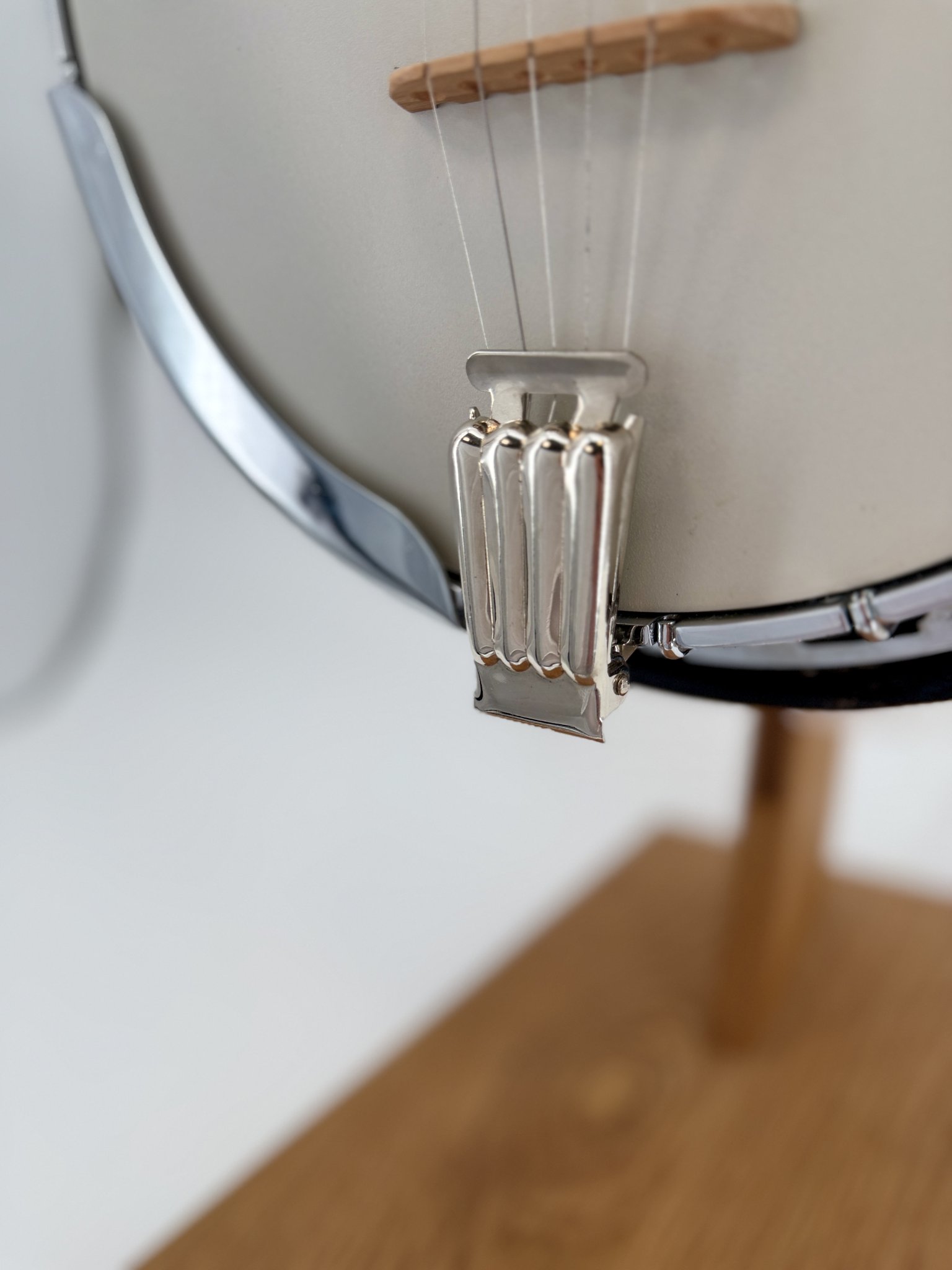 Tailpiece and maple bridge on a 1970s GTR Hearts and Flowers banjo