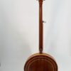 Back of a 1970s GTR banjo showing natural mahogany resonator with concentric ring purfling