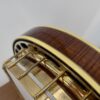Curly maple resonator side with multi-ply binding on a Gibson Earl Scruggs Golden Deluxe