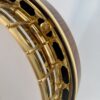 Gold hearts and flowers flange on a Gibson Earl Scruggs Golden Deluxe banjo