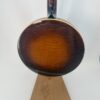 Flame curly maple resonator back in sunburst on a Gibson Earl Scruggs Golden Deluxe