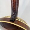 Flame maple neck heel joint on a Gibson Earl Scruggs Golden Deluxe banjo