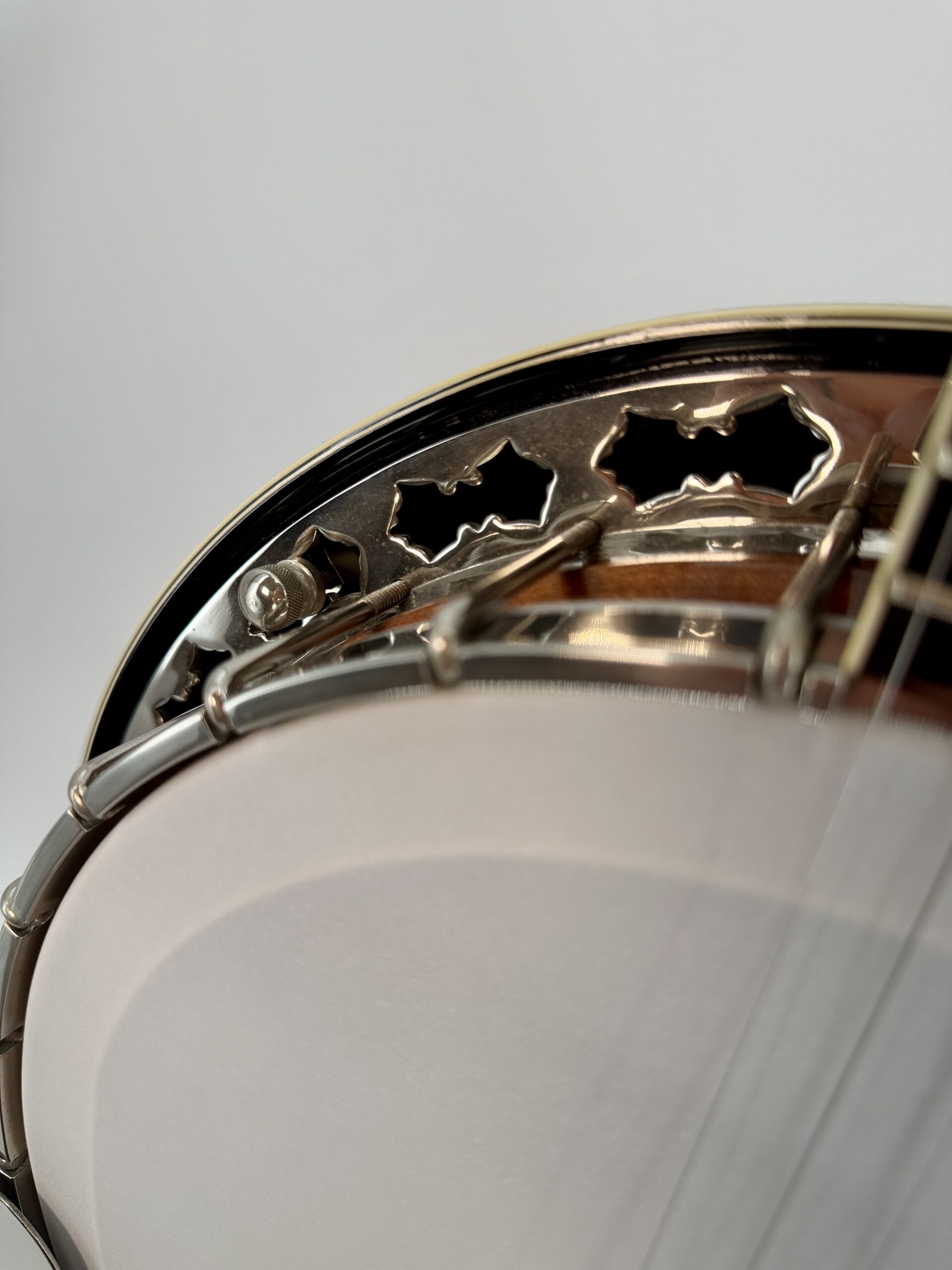 Close-up of the ornate Stelling pierced cut flange and resonator binding