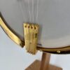 Engraved gold tailpiece reading Granada on a 1925 Gibson TB-Granada