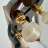 Tuning pegs on the five-string neck
