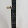 2009 Stelling Golden Cross banjo with a close view of the bound fingerboard inlays and fifth-string peg, at Banjo Warehouse in Yellow Springs, Ohio.