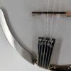 2009 Stelling Golden Cross banjo with a close view of the tailpiece and armrest, at Banjo Warehouse in Yellow Springs, Ohio.