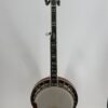 2010 Flint Hill FHB-280A banjo with a full front view of the inlaid peghead, bound fingerboard and pot on a display stand, at Banjo Warehouse in Yellow Springs, Ohio.