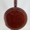 2010 Flint Hill FHB-280A banjo with the back of its mahogany resonator with two purfling rings, at Banjo Warehouse in Yellow Springs, Ohio.