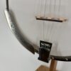 Window pane copy tailpiece, armrest and bridge of a Clancy Mullins banjo