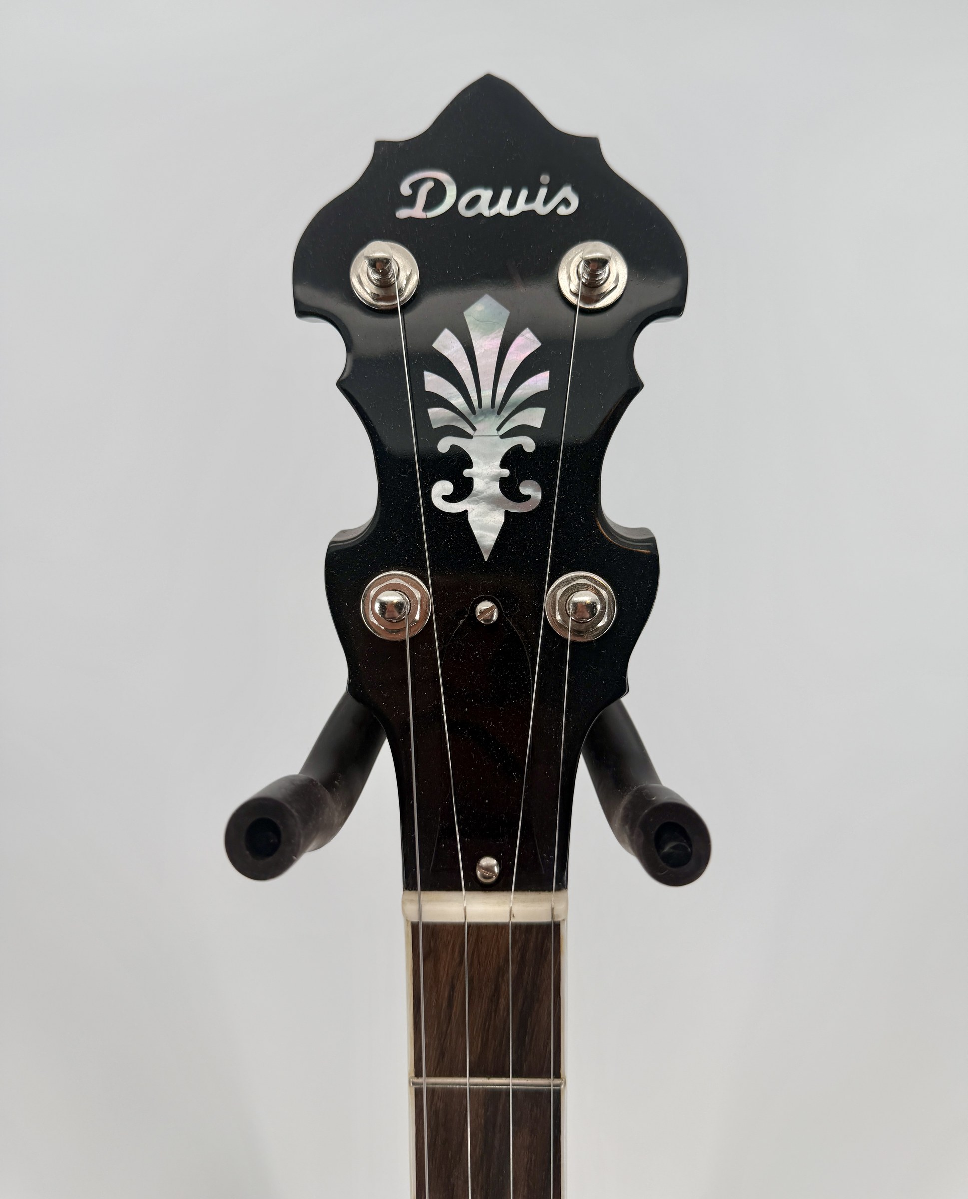 Davis pearl logo on the peghead of a 2015 Davis Concord Prototype