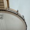 Deering Goodtime Americana openback banjo with the rim and hooks seen at an angle, at Banjo Warehouse in Yellow Springs, Ohio.
