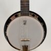 Deering Goodtime Six-R six-string resonator banjo with a front view of the pot showing the head, bridge and tailpiece, at Banjo Warehouse in Yellow Springs, Ohio.