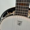 Deering Goodtime Six-R six-string resonator banjo with an angled view of the pot and Midnight Maple fingerboard, at Banjo Warehouse in Yellow Springs, Ohio.