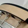 Deering Goodtime Six-R six-string resonator banjo with a close view of the maple resonator edge and brackets, at Banjo Warehouse in Yellow Springs, Ohio.