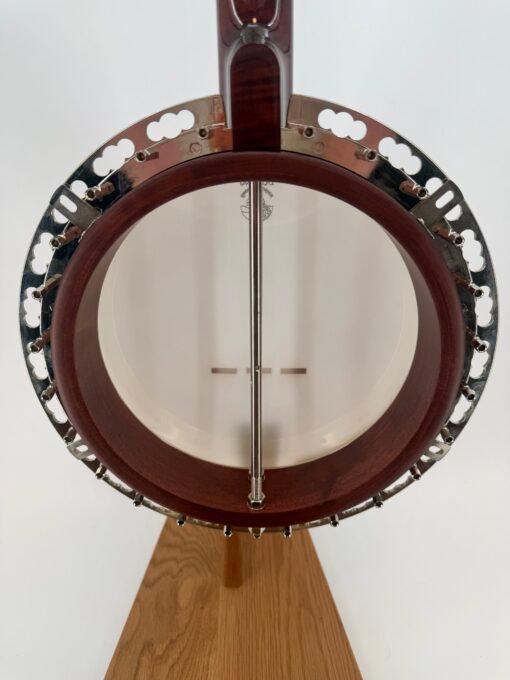 Interior of the three ply violin grade maple rim on a Deering Tenbrooks Saratoga Star banjo with the coordinator rod, resonator removed.