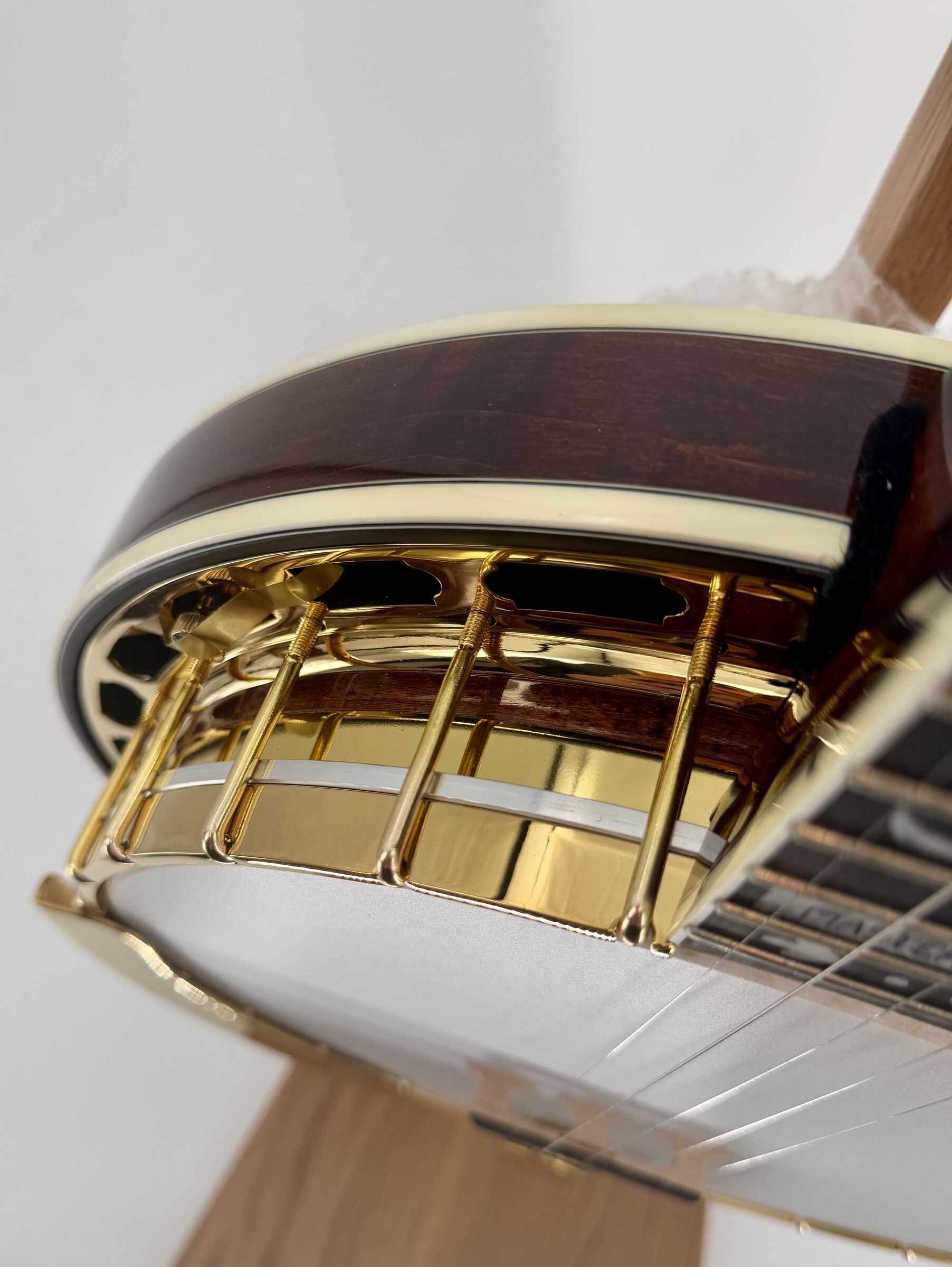 Gold plated one piece flange, hooks and tension hoop