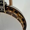 Neck heel and gold plated flange from the side